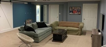 Semi-Private Large Guest Suite; bedroom, bath, and living room in Triad