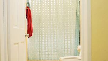 Shower, towels, soap, toilet paper