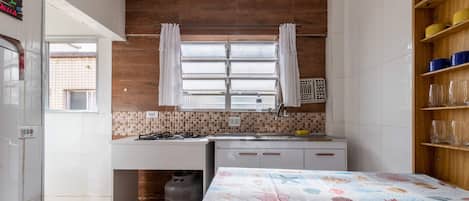 Fridge, stovetop, cookware/dishes/utensils