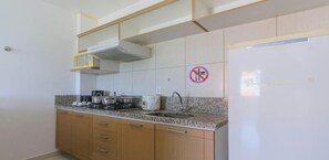 Microwave, stovetop, toaster, cookware/dishes/utensils