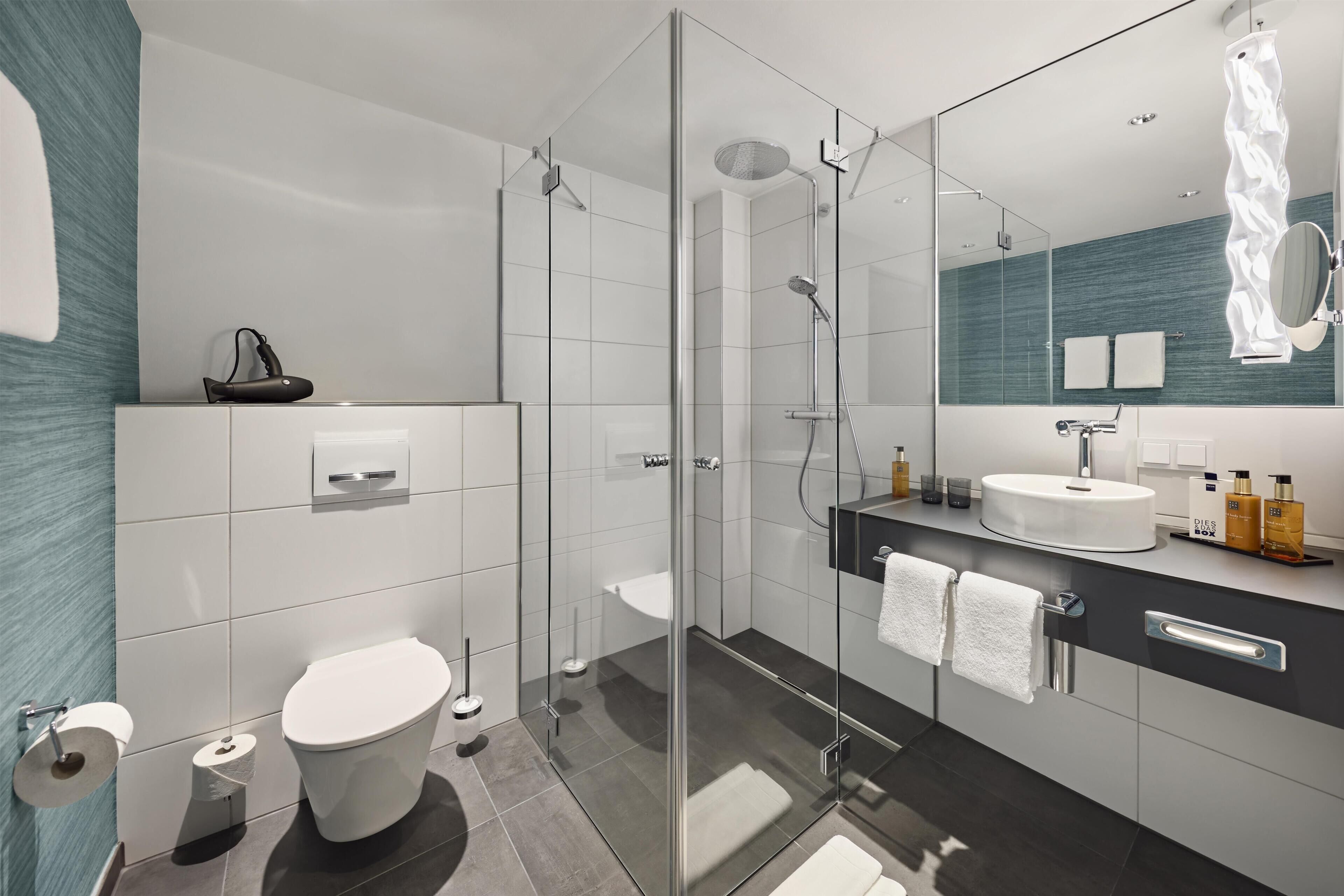 Shower, free toiletries, hair dryer, towels