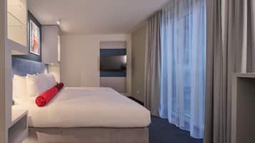 Blackout drapes, soundproofing, iron/ironing board, free WiFi