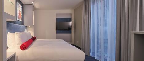 Blackout drapes, soundproofing, iron/ironing board, free WiFi