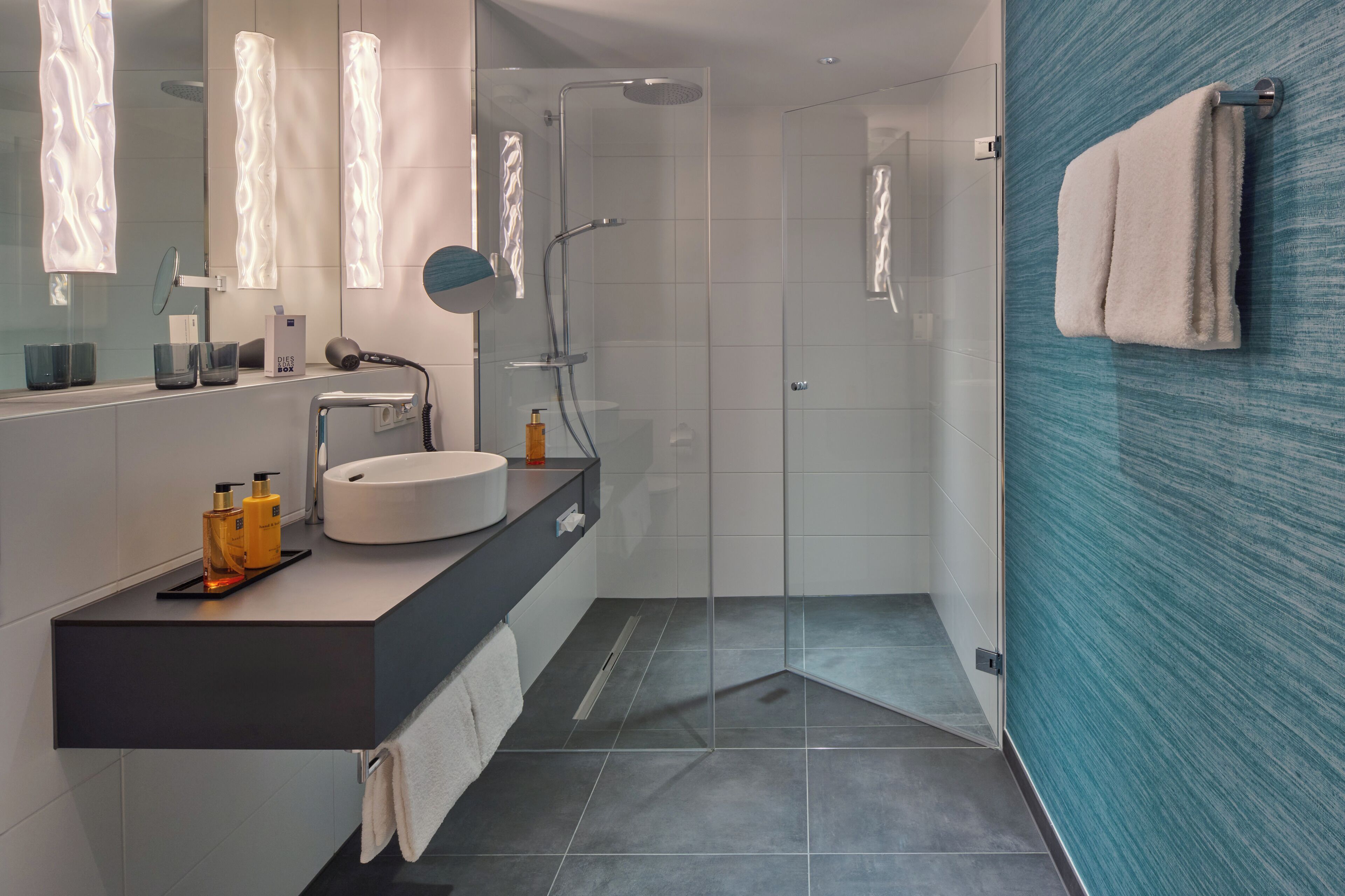 Shower, free toiletries, hair dryer, towels