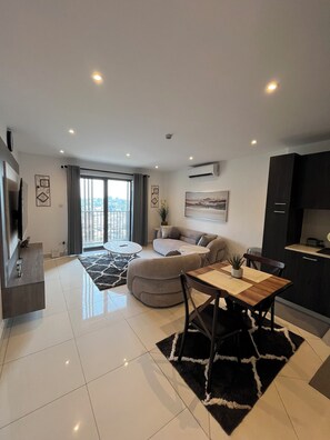 Deluxe Apartment, 1 Bedroom, City View | Living area - Easy Stay at Loxwood Apartment (Accra)