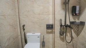 Shower, hair dryer, towels, shampoo