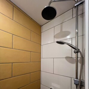 Shower, hair dryer, towels, toilet paper