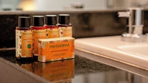 A bathroom counter with PHYTOERVAS products and a soap bar. - DAWN 145 (Vila Olímpia São Paulo)