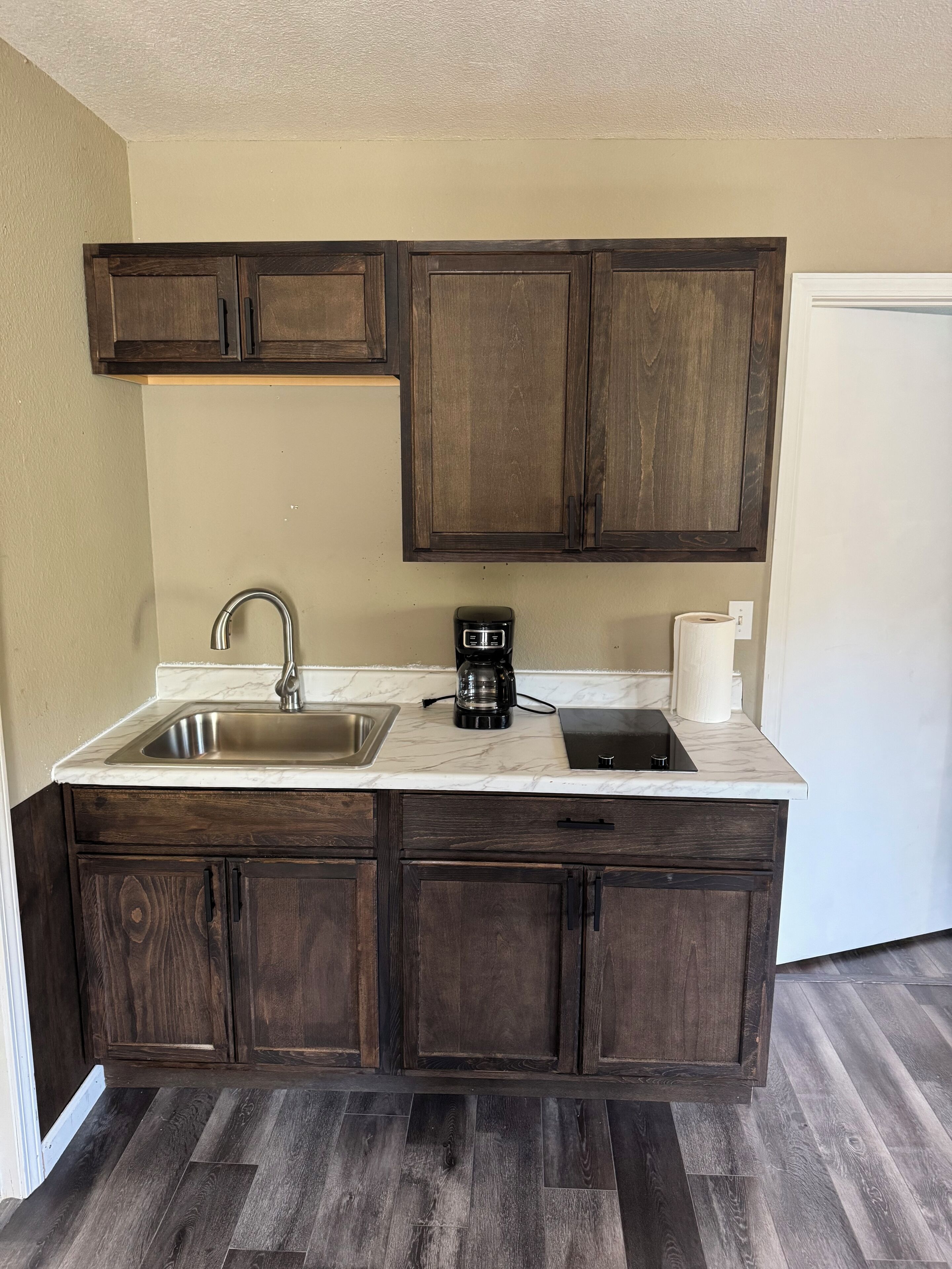 Fridge, microwave, stovetop, coffee/tea maker