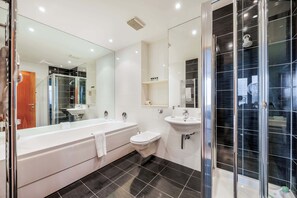 Shower, hair dryer, towels