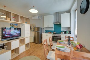 Family Apartment, Multiple Bedrooms (Vicky Loft Gardone-relax & Vittoriale) | Private kitchen | Fridge, oven, stovetop, coffee/tea maker