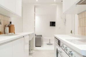 Comfort Apartment | Private kitchen | Fridge, microwave, oven, stovetop