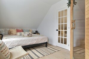 1 bedroom, desk, iron/ironing board, travel crib