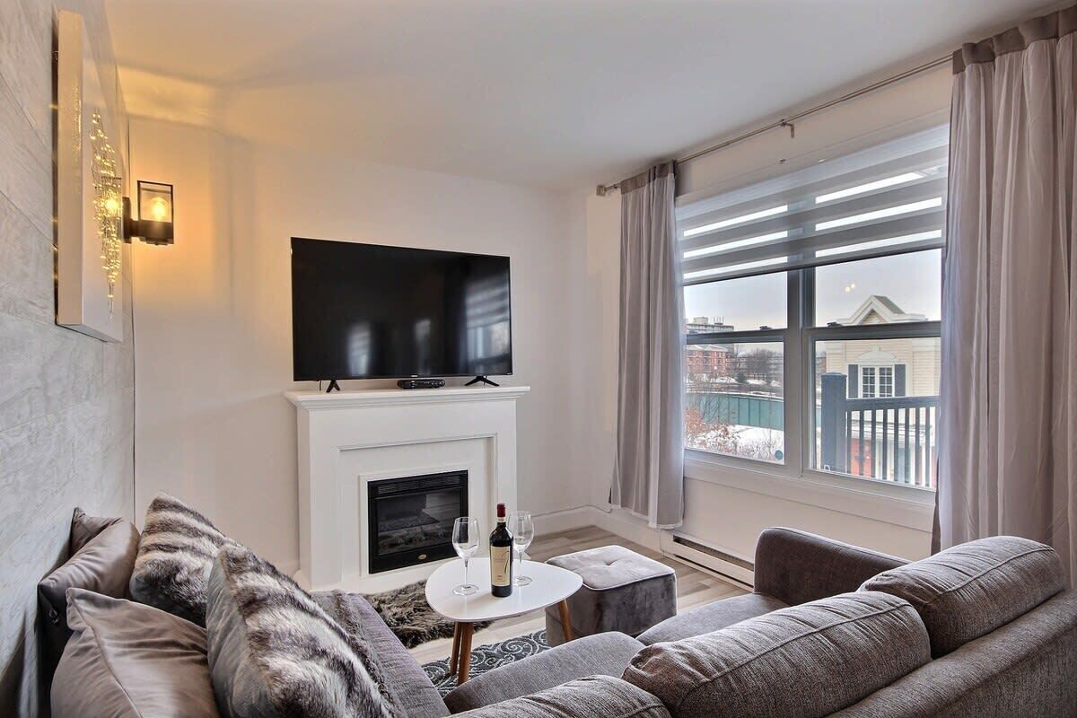 TV, fireplace, books, offices