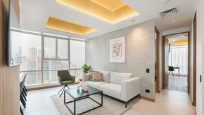 Grand Apartment, City View | Living area | 50-inch Smart TV with digital channels, Netflix, streaming services - Bio 26 Apartments  (Medellín)