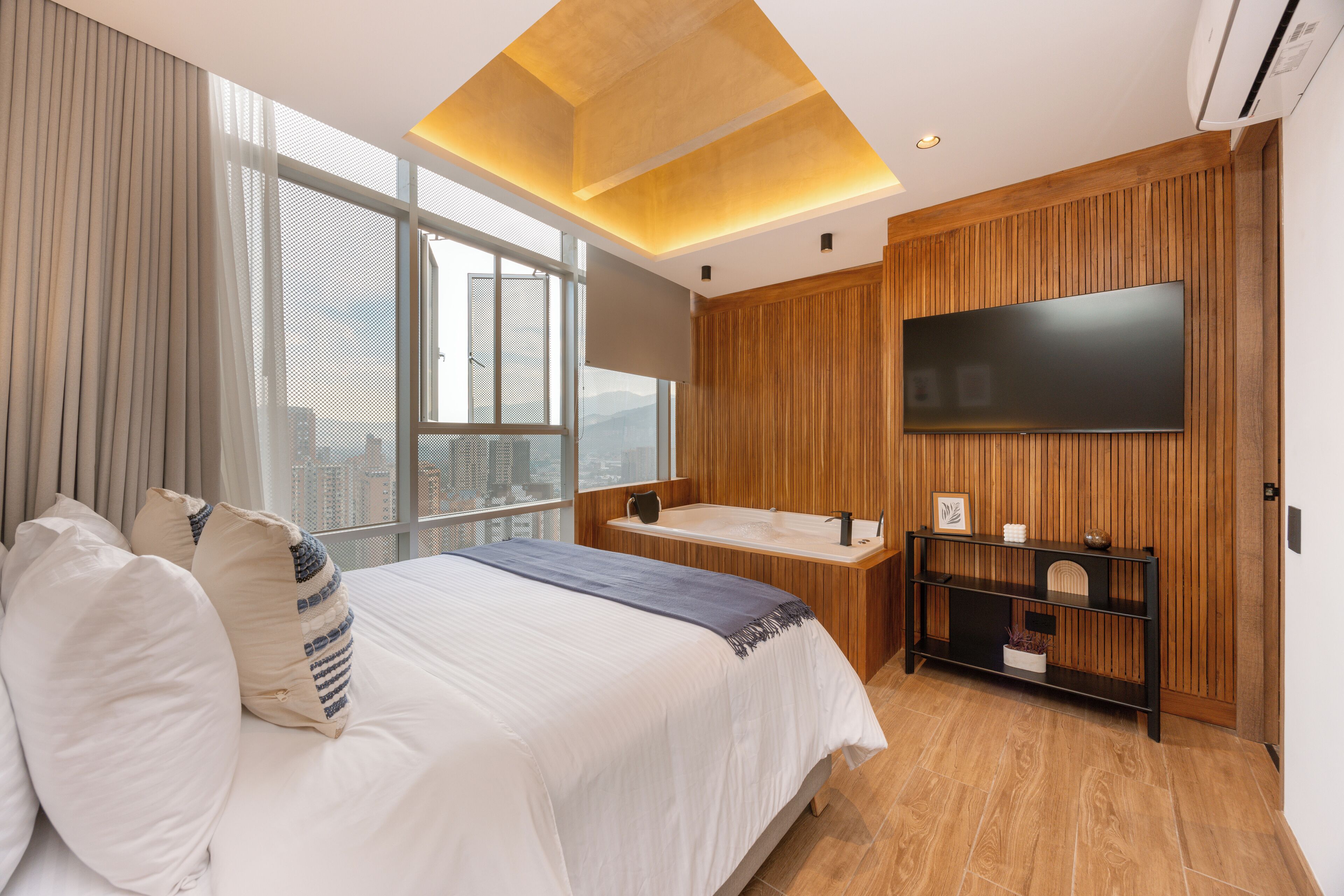 Elite Apartment, City View | Premium bedding, down comforters, in-room safe, individually decorated