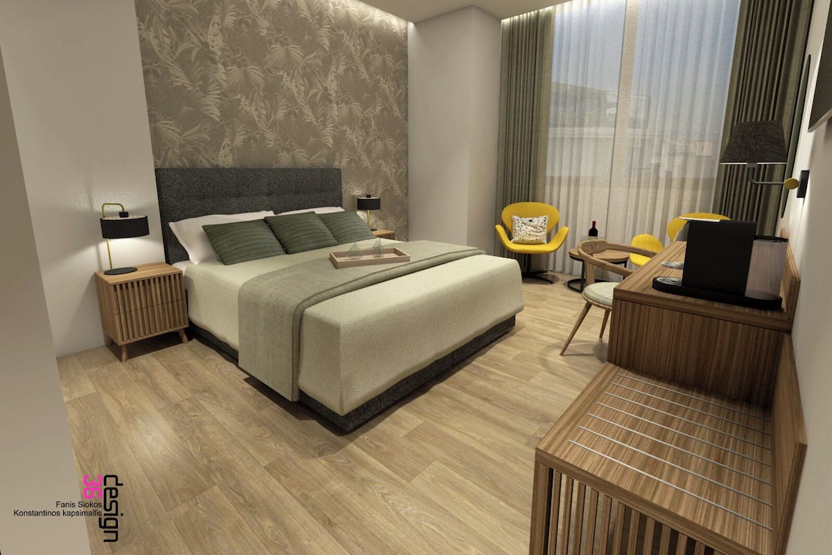 A modern bedroom with a large bed, bedside tables, a desk, and a chair.