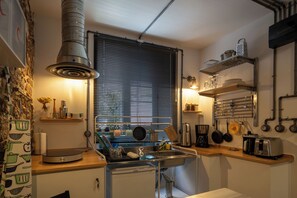 Appartement Deluxe | Cuisine privée | Réfrigérateur, lave-vaisselle, vaisselle et ustensiles