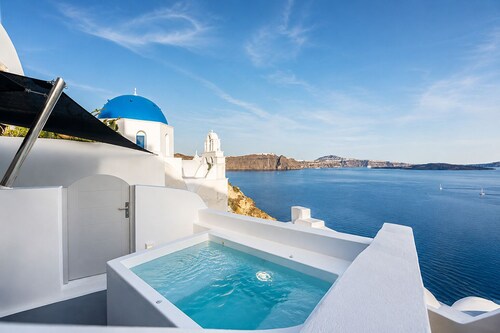 Three Domes Oia - an Iconic Collection