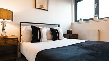 2 habitaciones, tabla de planchar con plancha, cuna de viaje y wifi