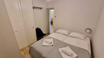 1 bedroom, desk, iron/ironing board, travel cot