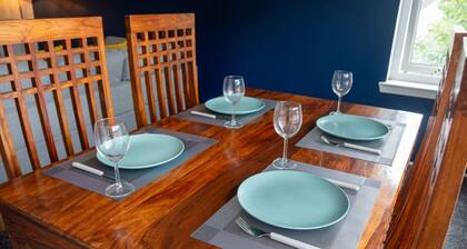 Modern Apartment with Dining, Workspace & Cooking