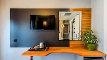 Deluxe Double Room Single Use, Patio, Hill View | Minibar, in-room safe, desk, laptop workspace