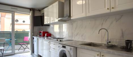Fridge, microwave, stovetop, coffee/tea maker