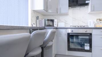 Microwave, oven, toaster, cookware/dishes/utensils