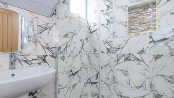 Shower, hair dryer, towels