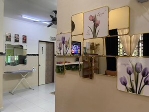 55-inch Smart TV with digital channels, Netflix, first-run films