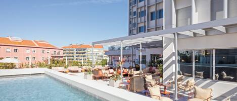 Seasonal outdoor pool, pool umbrellas, pool loungers
