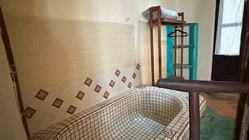 Papa Chuy Room | Badkamer | Zeep, shampoo, toiletpapier