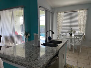 Fridge, microwave, oven, stovetop - Near Disney 4Bd/3Ba Villa w/ Private Pool, Hot Tub in Gated Resort Community (Kissimmee)