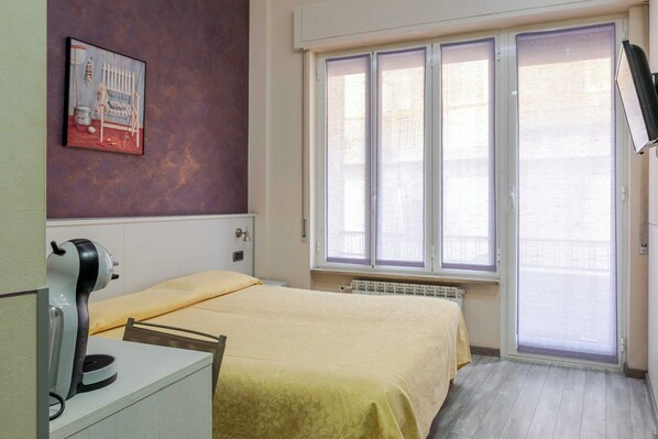 Desk, free WiFi, bed sheets