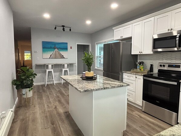 Microwave, oven, stovetop, dishwasher - Spacious & Stylish 3-bedroom house in charming Providence, a block from PC (Providence)