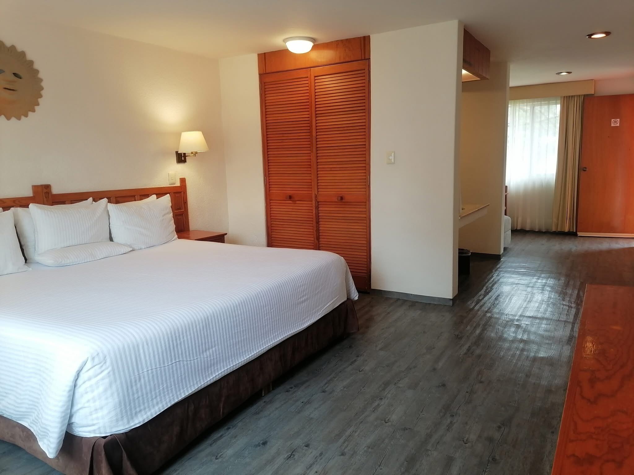 Junior Suite, 1 King Bed | Blackout drapes, iron/ironing board, bed sheets