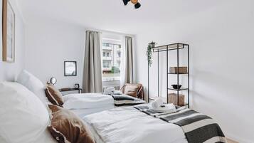 1 bedroom, desk, iron/ironing board, travel crib