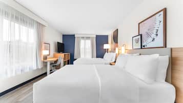 Tabla de planchar con plancha, wifi gratis y ropa de cama