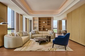 Basic Room, 1 King Bed | Living area | 65-inch LCD TV with cable channels - Hilton Garden Inn Chongqing Yubei Central Park (Chongqing)