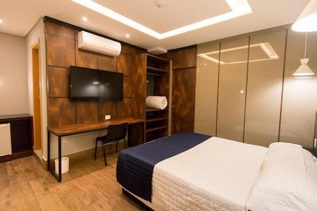 Deluxe Double Room | In-room safe, desk, laptop workspace, blackout drapes
