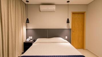 Deluxe Double Room | In-room safe, desk, laptop workspace, blackout drapes