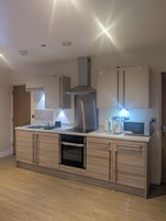 Superior Apartment, City View | Private kitchen | Full-size fridge, microwave, oven, stovetop