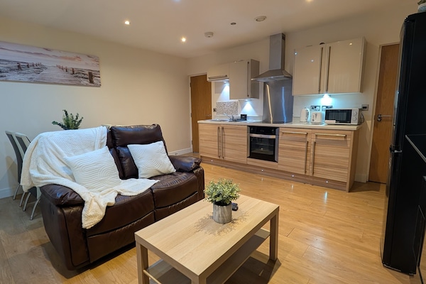 Superior Apartment, City View | Living area | 32-inch LCD TV with satellite channels, Netflix, streaming services