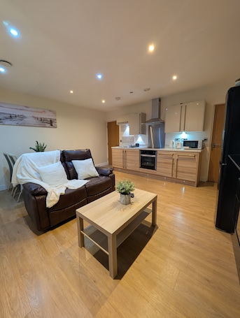 Superior Apartment, City View | Living area | 32-inch LCD TV with satellite channels, Netflix, streaming services
