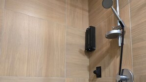A shower with a handheld showerhead and a wall-mounted control. - Cozy 1-bedroom apartment with AC, WiFi in excellent Taipei (Taipei)