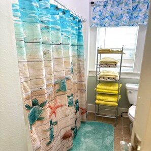 Hair dryer, towels, soap, toilet paper