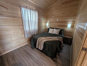 Comfort Cabin | 2 bedrooms, desk, free WiFi - Wichita's Spring Lake RV Resort (Halstead)