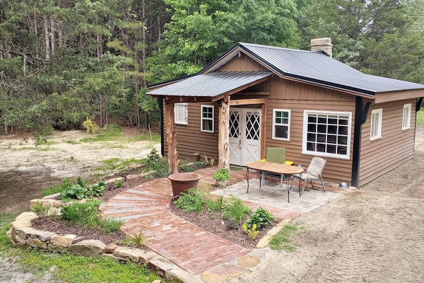 Cooks Quarters w/ no-step walkway  leading to portico w/ private secure entrance
