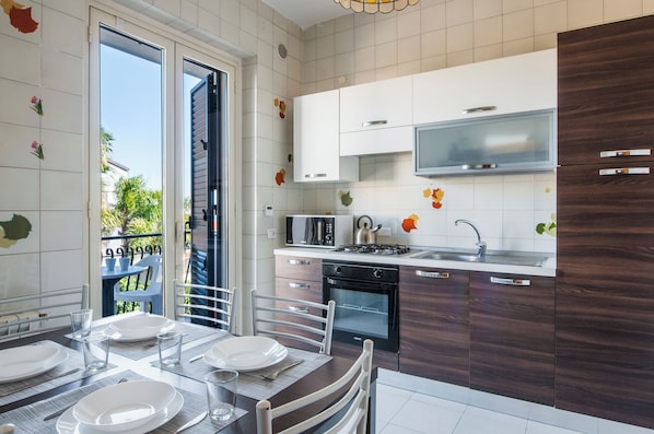 Fridge, microwave, stovetop, electric kettle